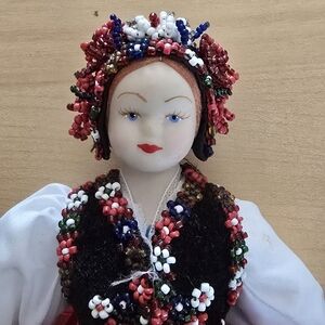 Colorful Beaded Doll with Traditional Attire